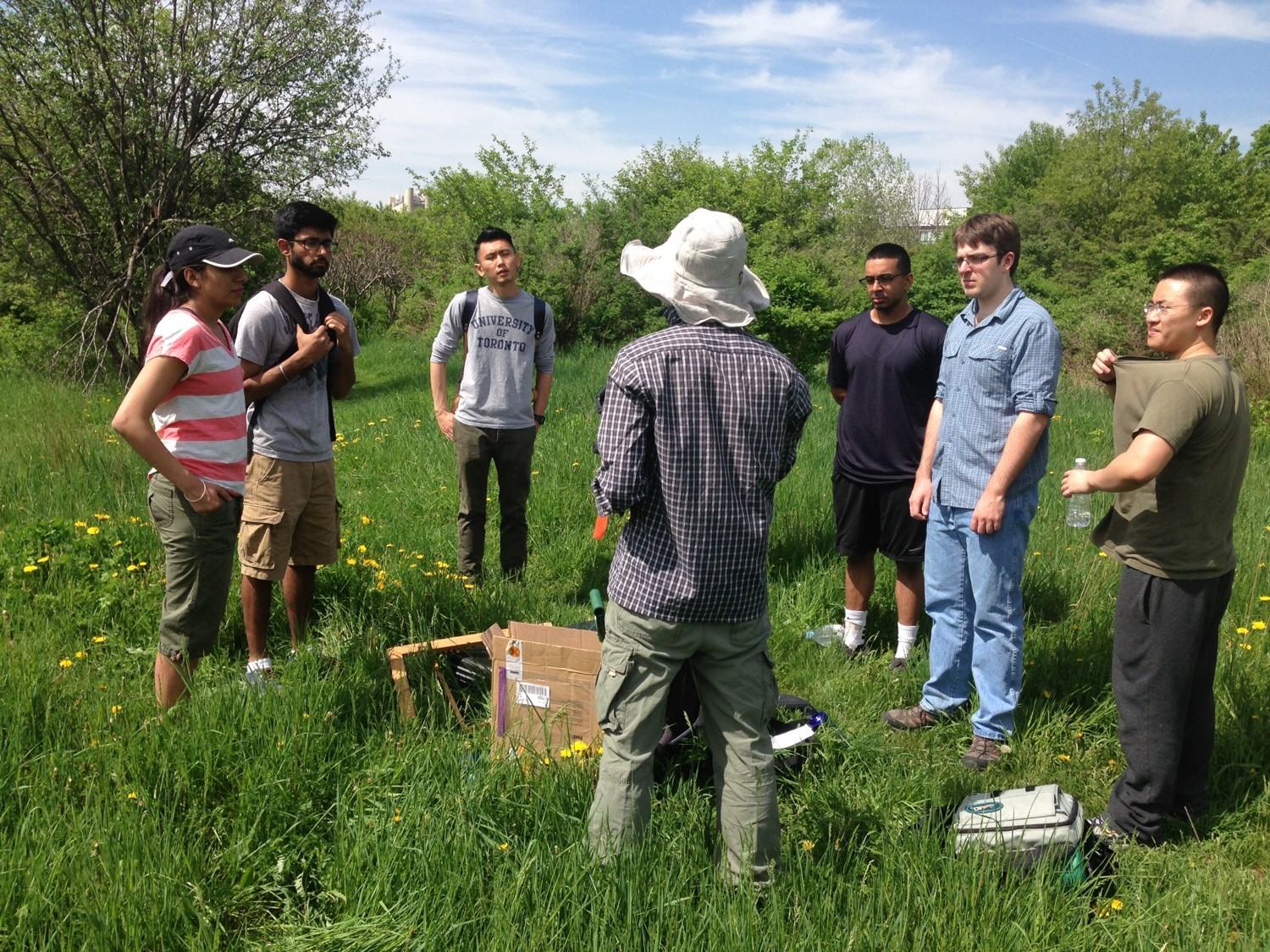 Students at a fieldwork training day in a grassland
